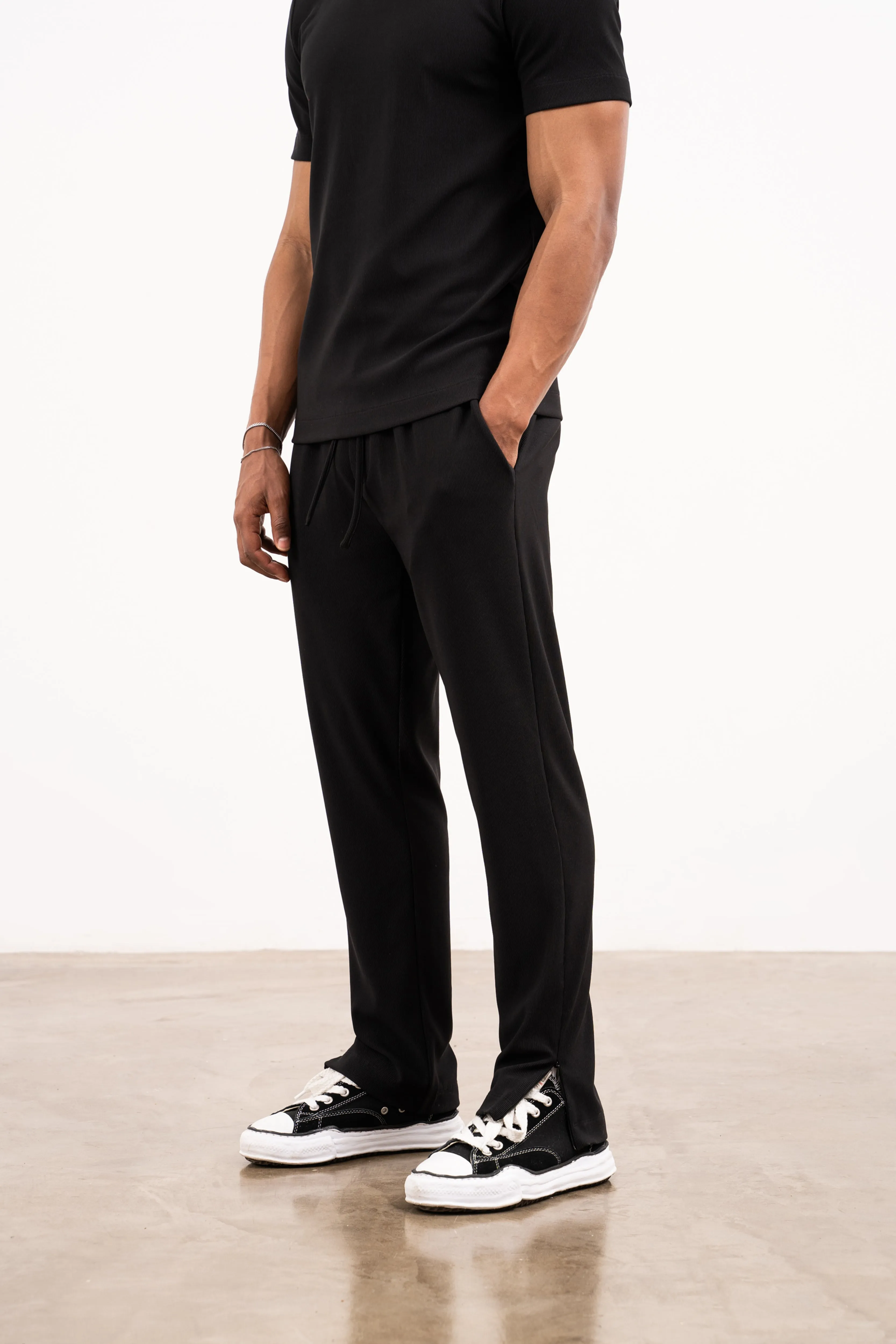 RIB TEXTURED TAPERED TROUSERS - BLACK